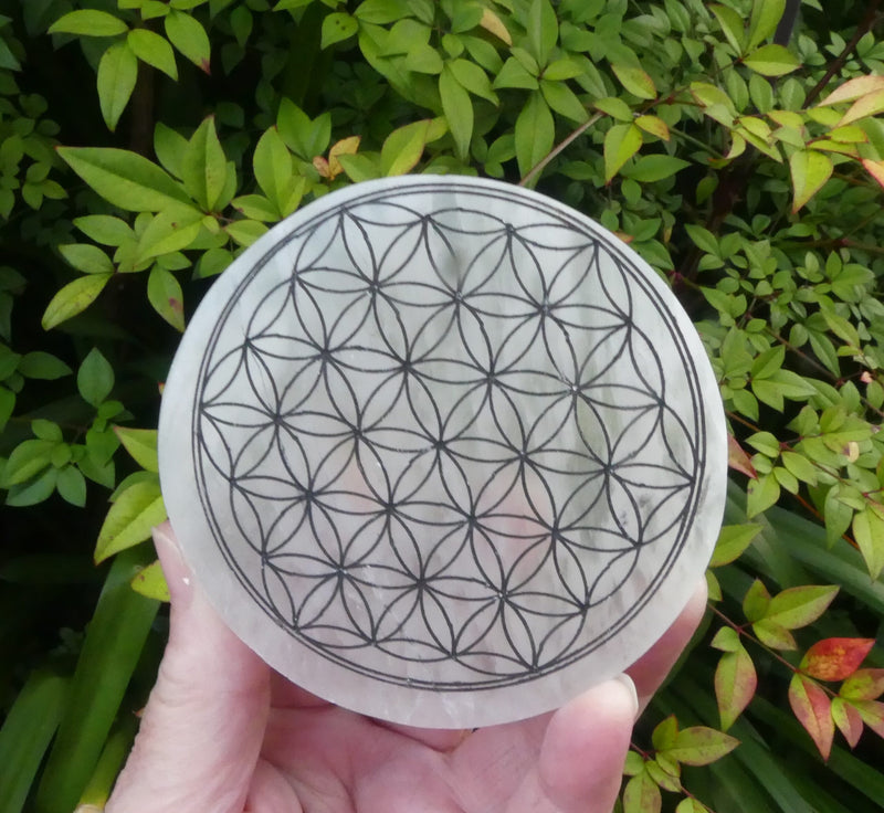 Selenite Charging Plate with the sacred Om symbol and the Flower of Life pattern