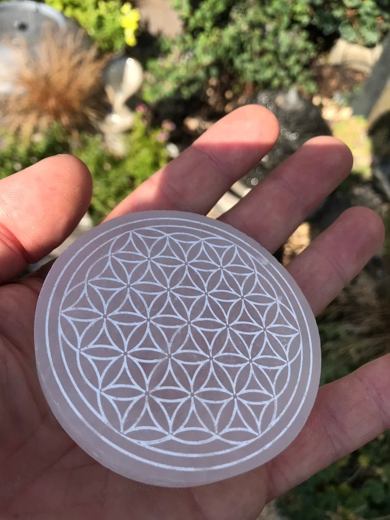 Selenite Charging Plate with the sacred Om symbol and the Flower of Life pattern