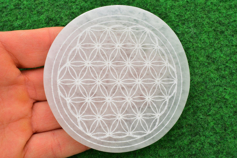 Selenite Charging Plate with the sacred Om symbol and the Flower of Life pattern