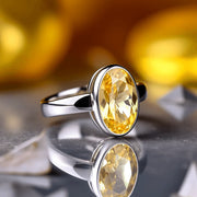 Oval Golden Yellow Sapphire Ring - Jupiter's Elegance | Brahmatells - BrahmatellsStore