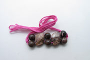 Rhodonite Rakhi: Embrace Compassion and Balance | Brahmatells - BrahmatellsStore